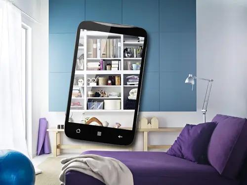 Photo d'un salon vu en réalité augmentée à travers un smartphone
